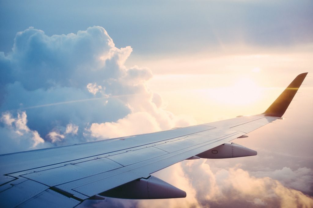 Airplane wing in the sky